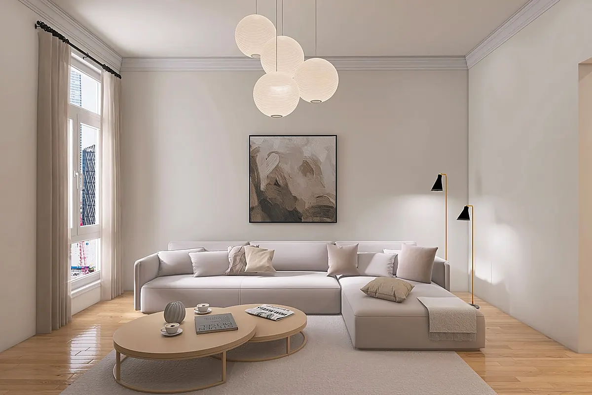 Bright open-plan living room with sofa and natural light, styling reference for a terrace home interior